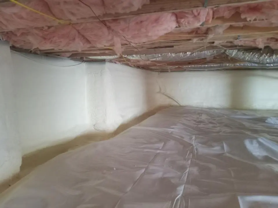 Crawl space encapsulation with closed-cell spray foam for Commercial Roof Restoration in Sappington